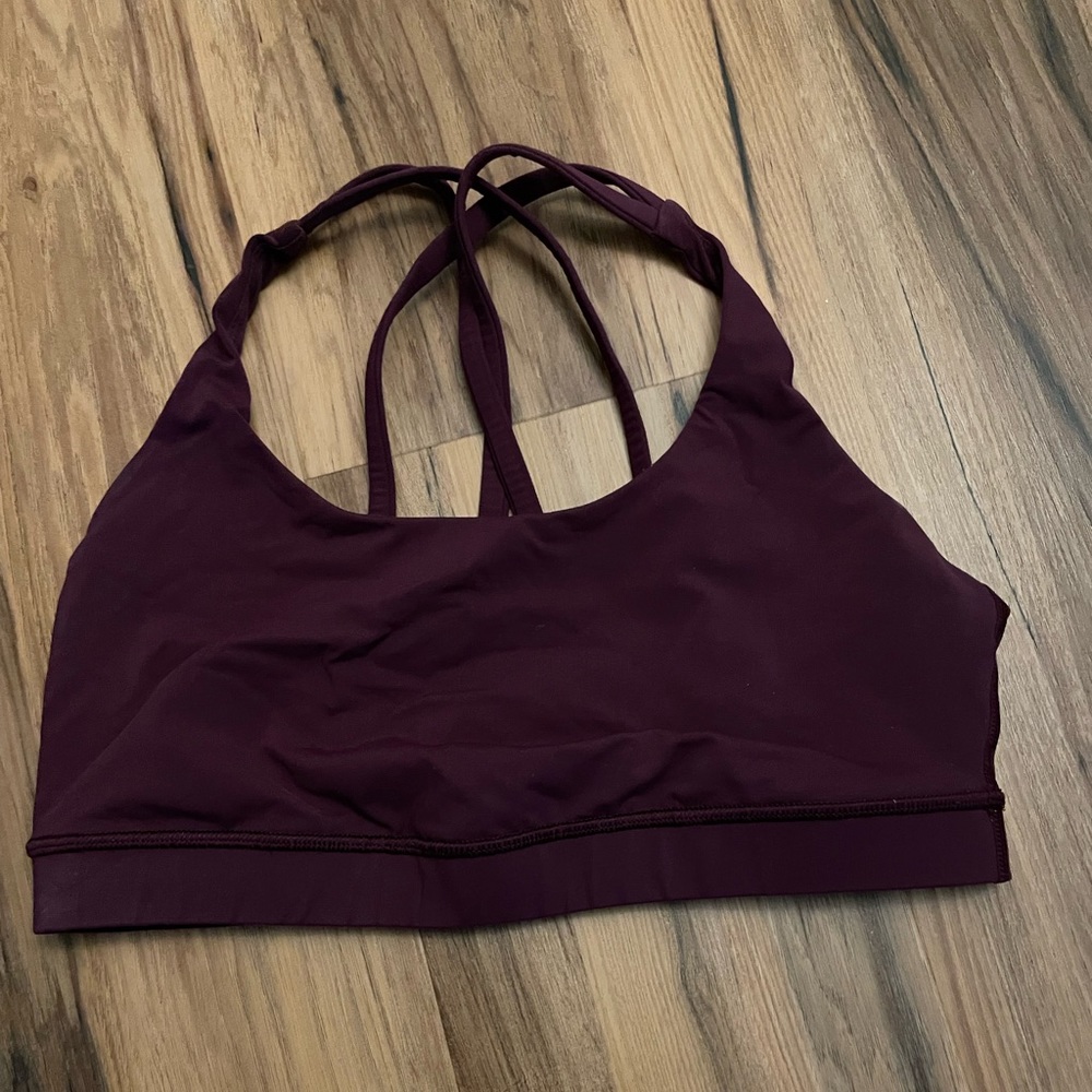 Lululemon Criss cross sports bra. Maroon. good condition only worn a few times.